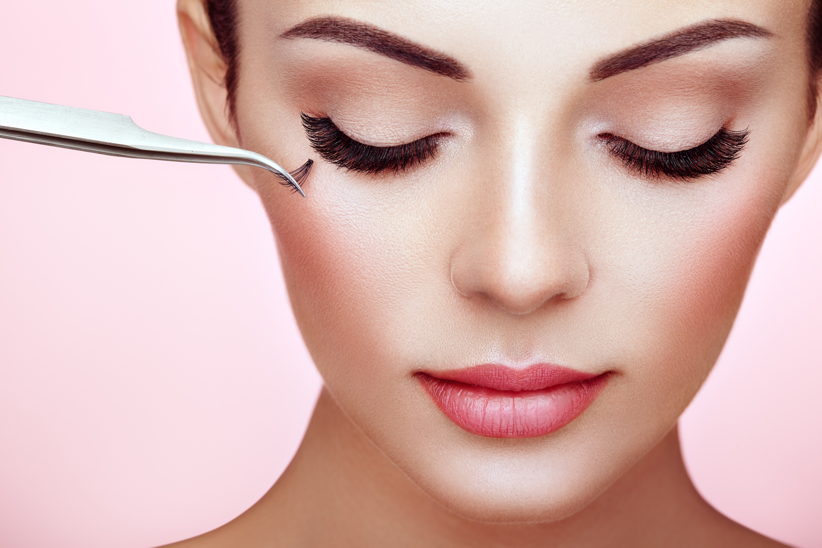 Beautiful Woman with Long False Eyelashes